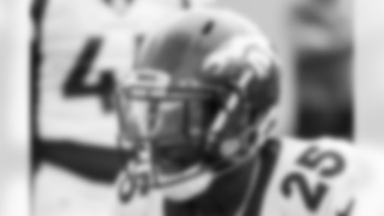 Melvin Gordon III (and Royce Freeman in his visor) during practice on the sixth day of training camp at UCHealth Training Center on August 3, 2021. (Photo by Ben Swanson)