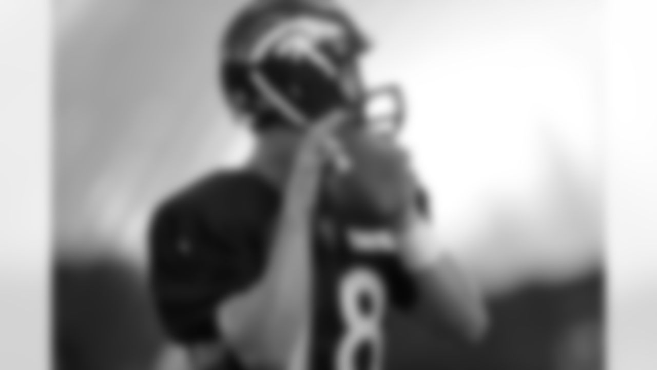 QB Peyton Manning looks downfield.