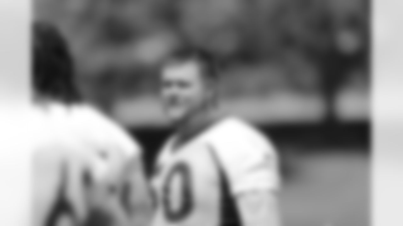 C J.D. Walton smiles as he awaits his turn during offensive line drills.