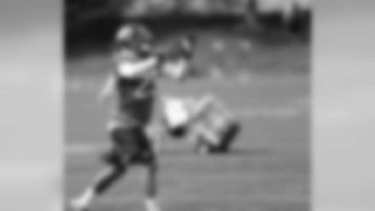 Harris makes a break on the ball.