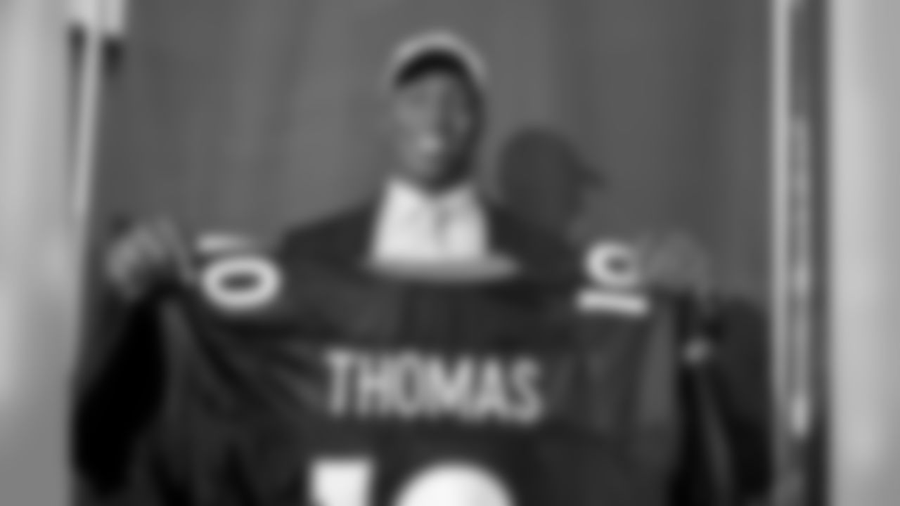 Drafted in the first round at 22nd overall of the 2010 NFL Draft, Demaryius Thomas holds up his jersey.