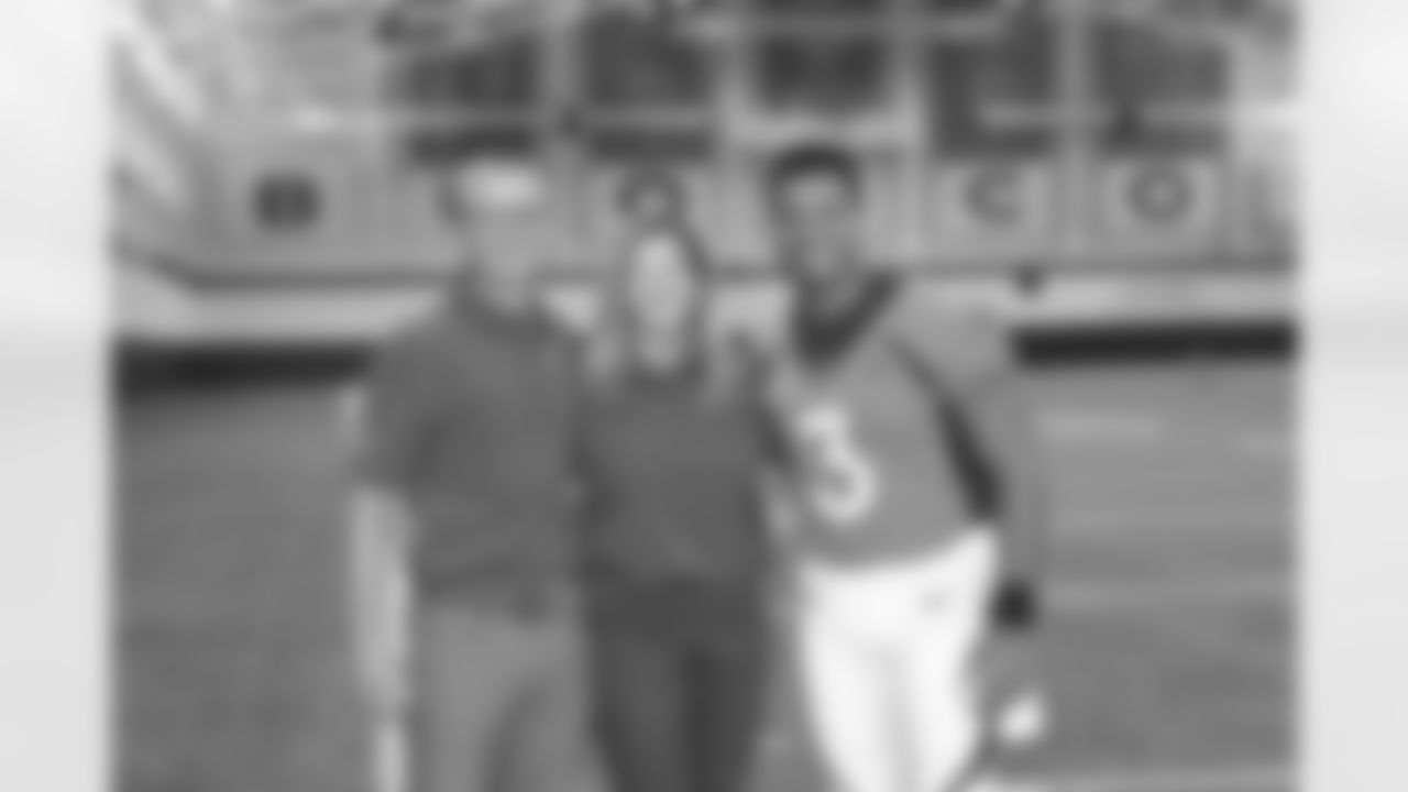 Greg Penner, Carrie Walton Penner and Russell Wilson during team picture day at UCHealth Training Center in Englewood, Colorado, on September 24, 2022. (Photo by Gabriel Christus)