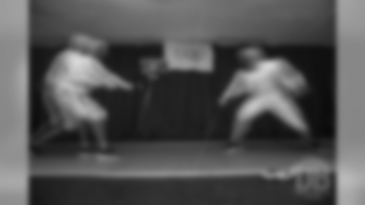 Brandon McManus and Casey Kreiter try their hands at fencing at the Denver Fencing Center on July 17, 2018.