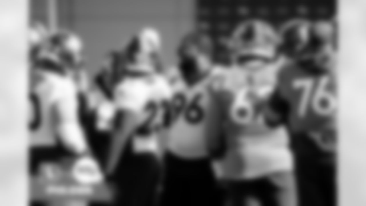 Shelby Harris breaks down the team huddle during practice at UCHealth Training Center in Englewood, Colorado on Friday, November 12, 2021. (Photo by Ben Swanson)