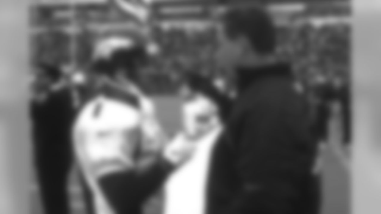 Buffalo: Jason Elam has a few words with Special Teams coach Rick Dennison against the Buffalo Bills at Rich Stadium in Orchard Park, NY on October 26, 1997.