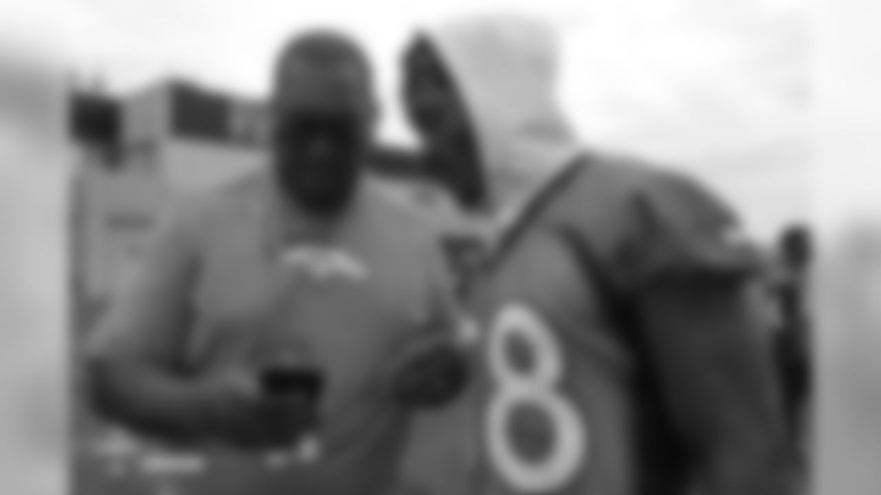 Wide receiver Demaryius Thomas (88) and former Bronco Orlando Franklin during the 10th day of training camp on August 8, 2018, at UCHealth Training Center.