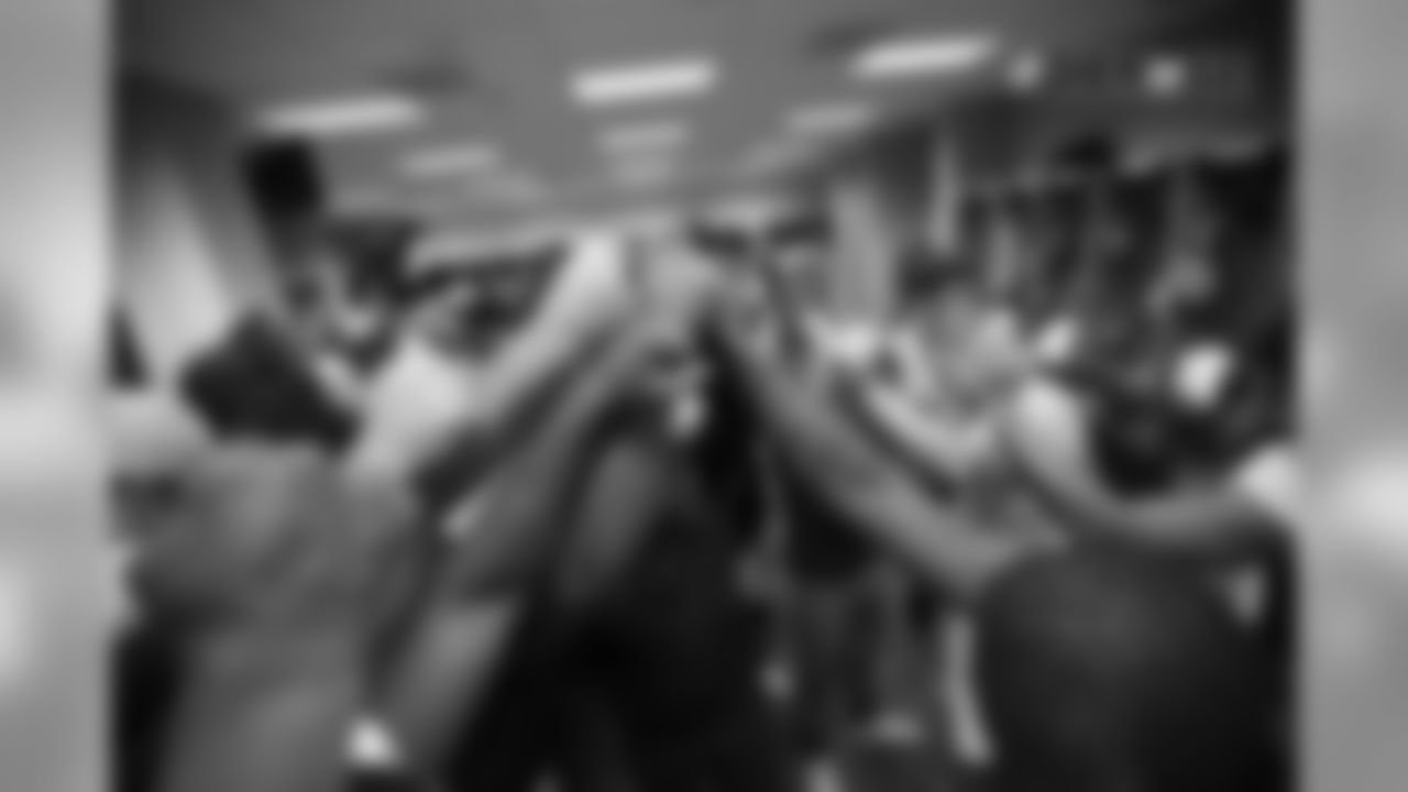 Broncos players and coaches raise their hands together in the locker room after the NFL preseason game against the Arizona Cardinals at University of Phoenix Stadium in Glendale, Arizona, August 30, 2018.
Photo by Gabriel Christus
