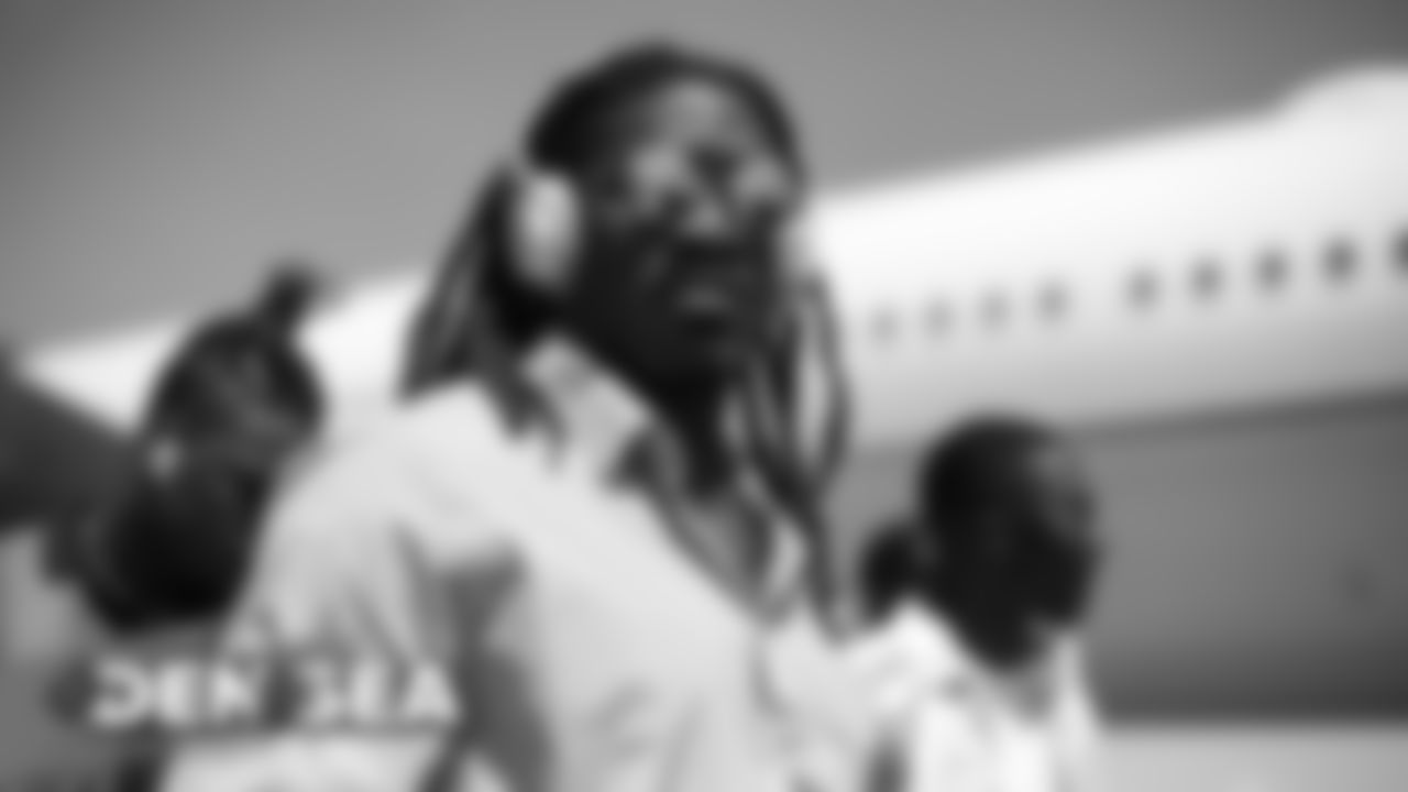 Alexander Johnson on the tarmac for the Broncos' flight to Seattle on August 7, 2019 ahead of their game against the Seahawks.