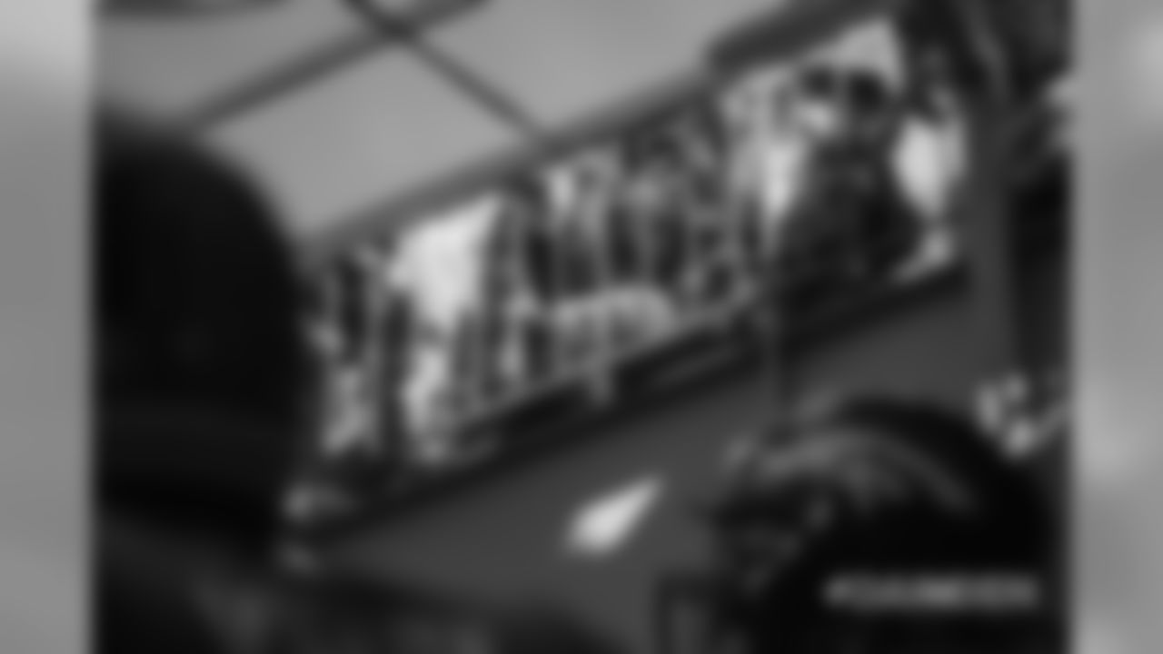 Fans take photos or videos on their cellphones of players in the tunnel during player introductions before the Broncos' game against the Oakland Raiders at Broncos Stadium at Mile High on September 16, 2018.