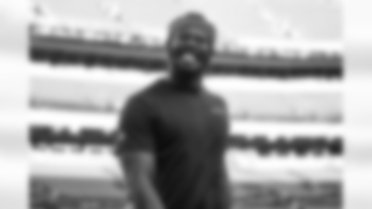 Von Miller smiles as he warms up before the final training camp practice at Empower Field at Mile High on September 4, 2020. (Photo by Ben Swanson)