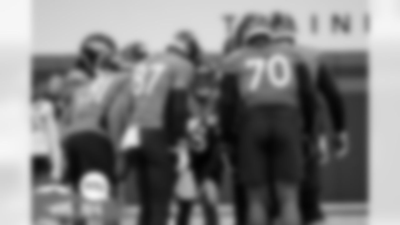 Teddy Bridgewater talks to the offense in the huddle during practice at UCHealth Training Center in Englewood, Colorado on October 26, 2021. (Photo by Ben Swanson)