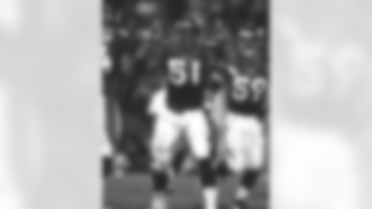 Denver: John Mobley celebrates a great play on defense against the Oakland Raiders at Mile High Stadium in Denver, CO on November 24, 1997.