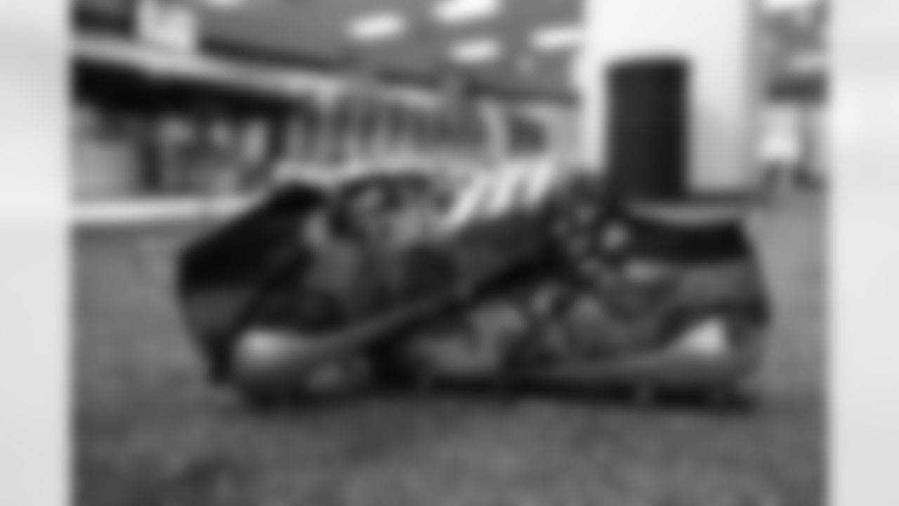 Courtland Sutton's cleats in the locker room before the Broncos' Week 3 game against the New York Jets at Empower Field at Mile High in Denver, Colorado on September 26, 2021. (Photo by Sam Weaver)