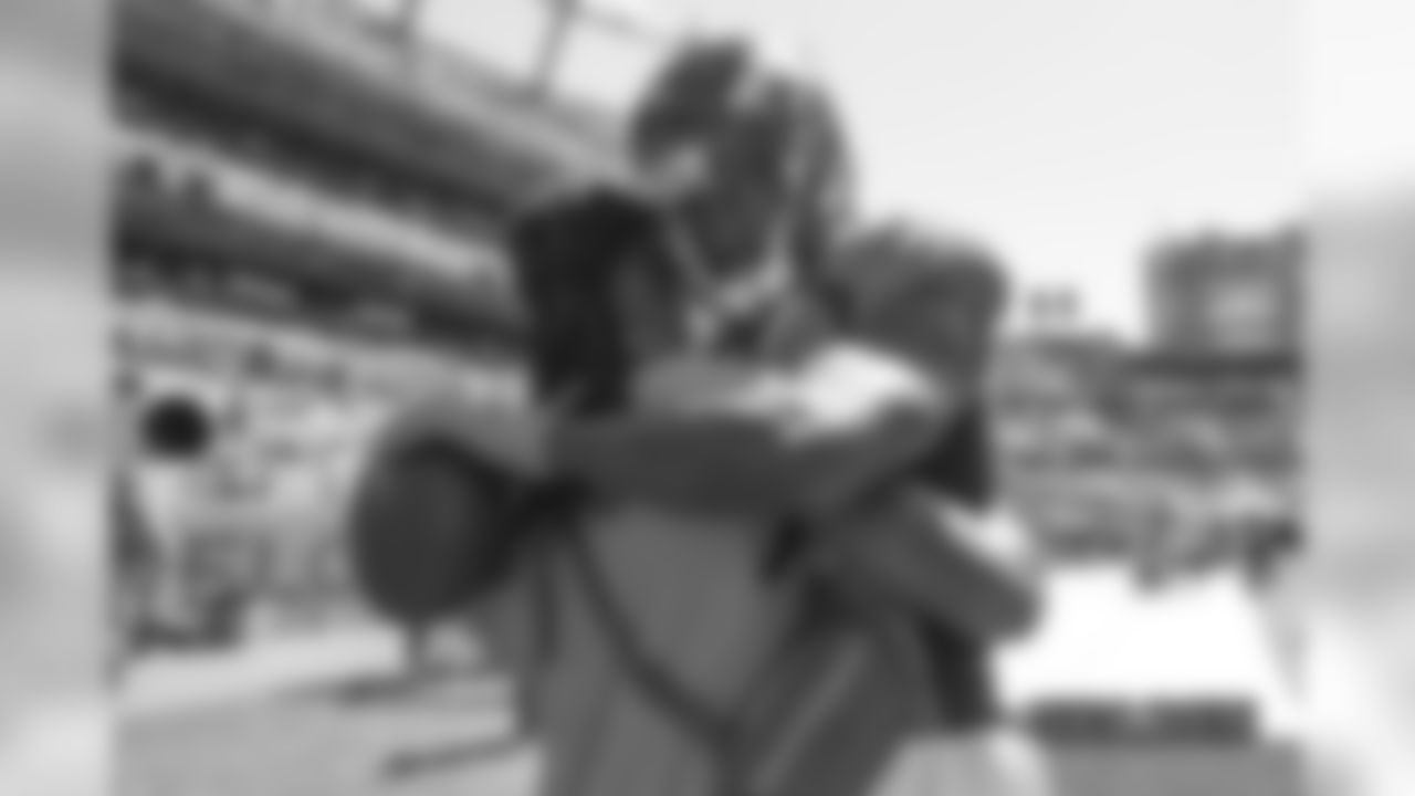 Demaryius Thomas greets former Bronco Omar Bolden before the Broncos' Week 1 game against the Seattle Seahawks at Broncos Stadium at Mile High on September 9, 2018.