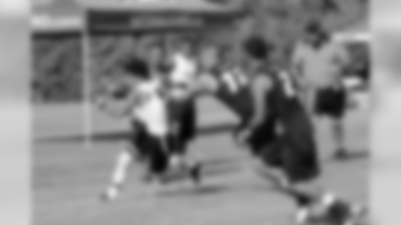 Chance Callahan and Jordan Iacovetta converge on a Chargers wide receiver.
