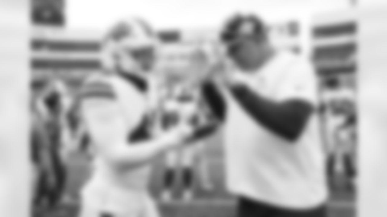 Garett Bolles and Von Miller during pregame warmups before the Broncos' preseason Week 2 game against the Buffalo Bills at Highmark Stadium in Orchard Park, New York on August 20, 2022. (Photo by Ben Swanson)
