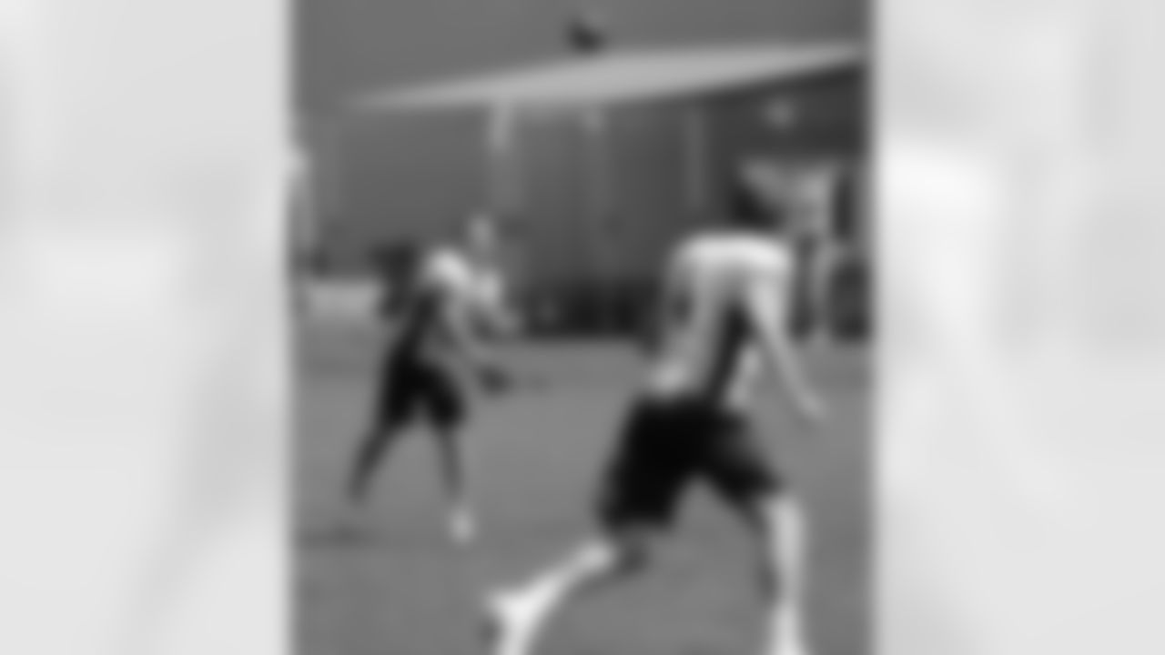 Colquitt and K Matt Prater play catch during a break in practice.
