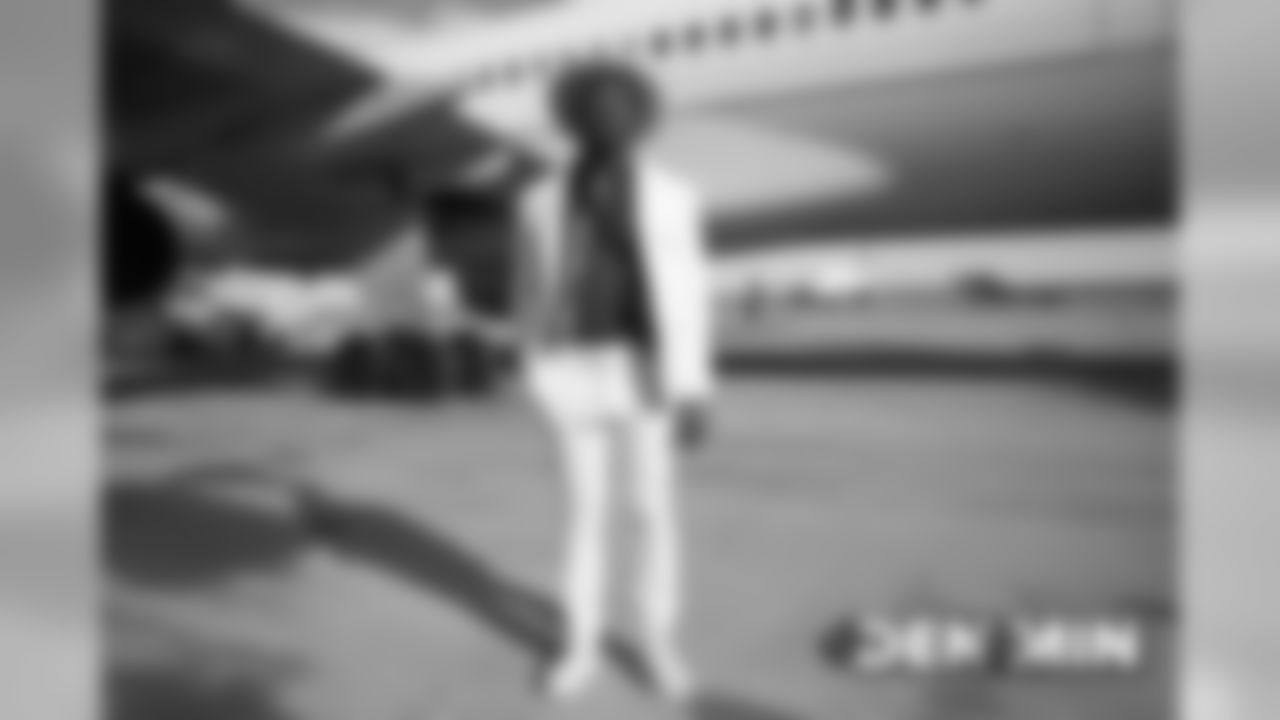 Von Miller on the tarmac at Denver International Airport during the team's travel to Minnesota on November 16, 2019 to face the Vikings.. (Photo by Gabriel Christus)