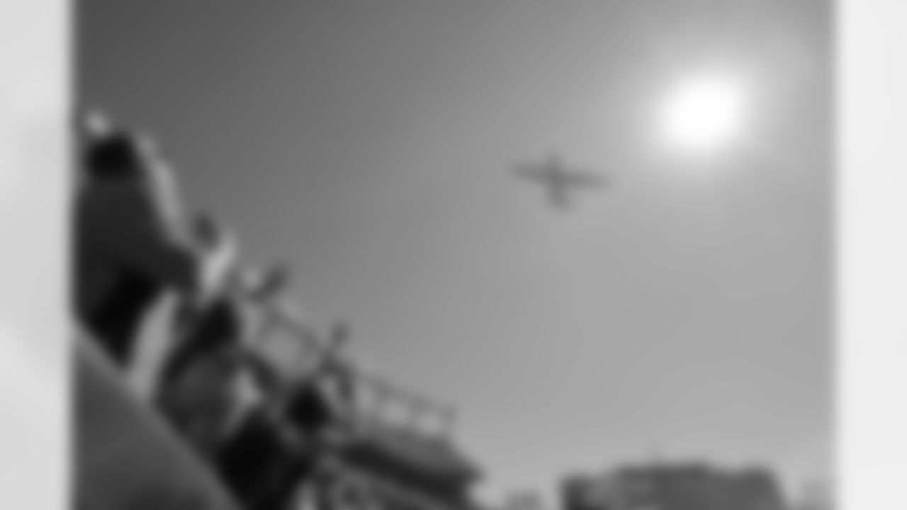 Fans react to a flyover of a Peterson Air Force based C130 prior to kickoff of the NFL game between the Denver Broncos and the Houston Texans in Denver, Sept.18, 2022.
(Photo: Eric Lars Bakke)