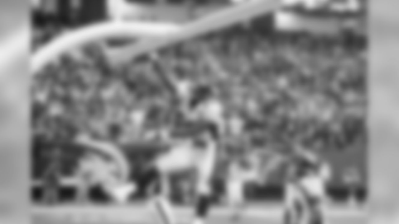 Tight end Daniel Graham, who caught the go-ahead touchdown from QB Jay Cutler with 5:42 left in the game, celebrated his score by dunking on the goalpost, a move since outlawed by the NFL in 2014.