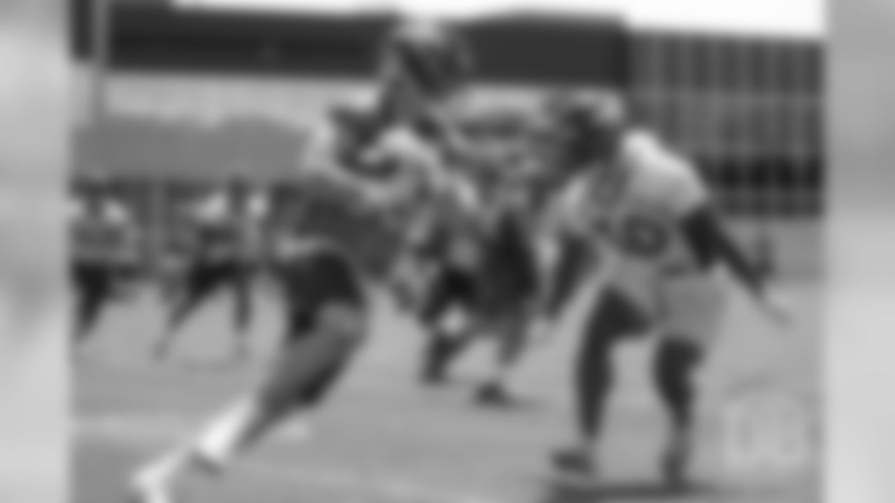 tight end Matt LaCosse (83) tries to elude safety Jordan Moore (30) during practice at the eighth day of OTAs on June 5, 2018.