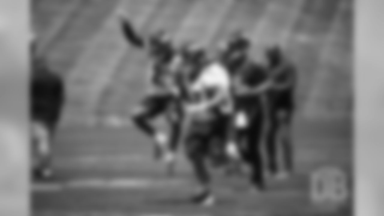 Josey Jewell celebrates with Kareem Jackson after Jewell's interception during the Broncos' practice on the ninth day of their OTAs on May 31, 2019.