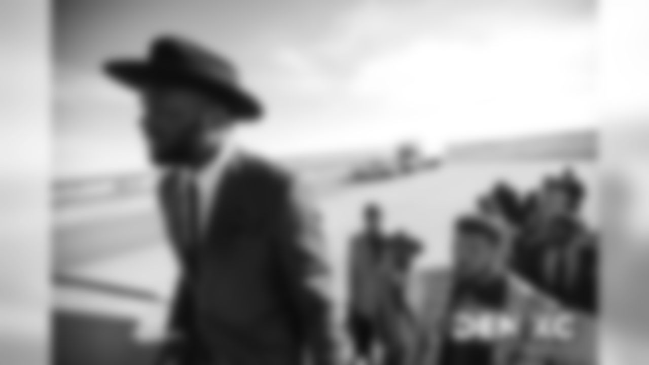 Royce Freeman on the tarmac at Denver International Airport during the team's travel to Missouri on December 14, 2019 ahead of their Week 15 game against the Kansas City Chiefs. (Photo by Ben Swanson)