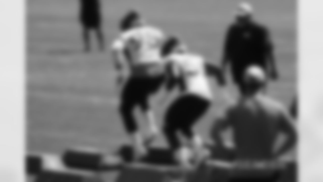 Derek Wolfe and Todd Davis during practice at UCHealth Training Center on September 5, 2018.