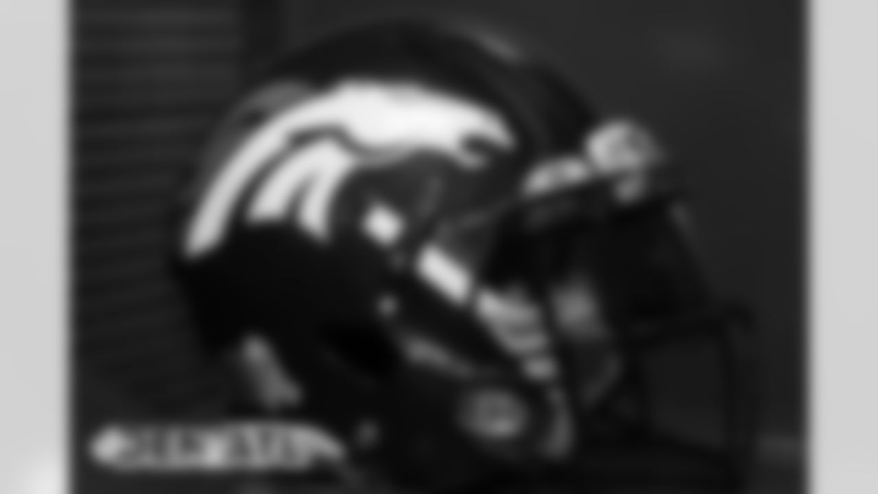 A player's helmet in the locker room before the Broncos' Week 9 game against the Atlanta Falcons at Mercedes-Benz Stadium in Atlanta, Georgia. (Photo by Gabriel Christus)