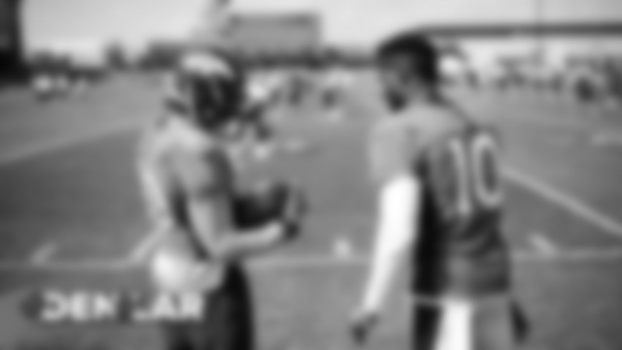 Phillip Lindsay and Emmanuel Sanders at practice at UCHealth Training Center on August 27, 2019. (Photo by Ben Swanson)