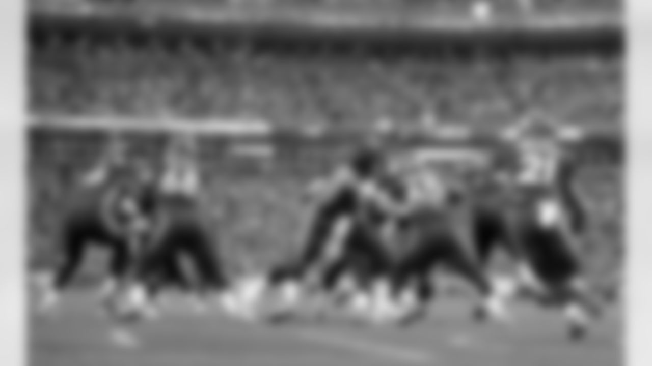 Manning hands off to Hillman after the Chargers downed a punt at the Denver 2-yard line.