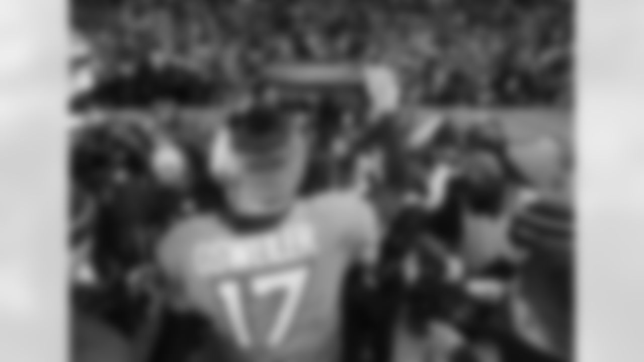 Denver Broncos quarterback Brock Osweiler (17) waves to the crowd after action against the Cincinnati Bengals in the NFL game at Sports Authority Field in Denver, CO, December 28, 2015. Photo by Ben Hays.