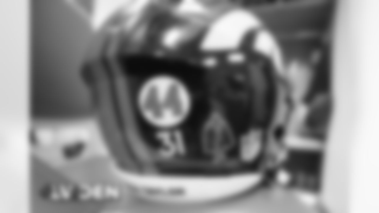 Justin Simmons's helmet, featuring a decal in honor of Floyd Little, in the locker room before the Broncos' Week 17 game against the Las Vegas Raiders at Empower Field at Mile High in Denver, Colorado on January 3, 2021. (Photo by Joe Abdellah)