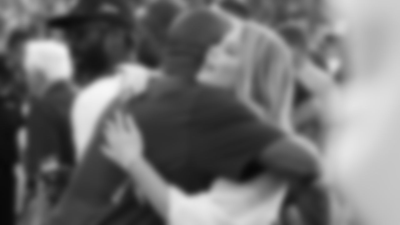 Champ Bailey hugs Christianna Bowlen before the Broncos' preseason matchup with the Falcons in the Pro Football Hall of Fame Game on August 1, 2019 at Tom Benson Hall of Fame Stadium.