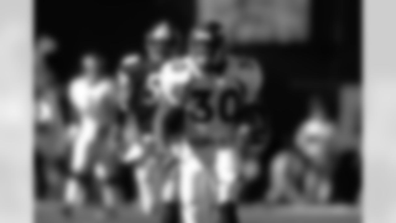 Terrell Davis races down the field in the 1997 AFC Championship. Davis rushed for 139 yards in the game.