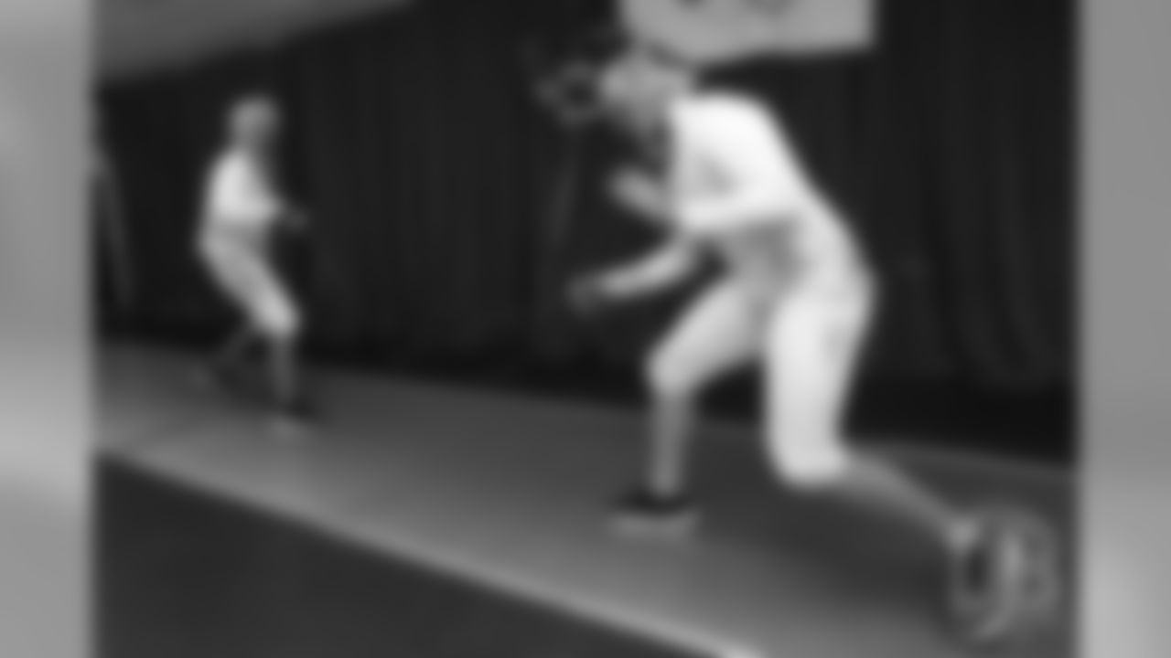 Brandon McManus and Casey Kreiter try their hands at fencing at the Denver Fencing Center on July 17, 2018.