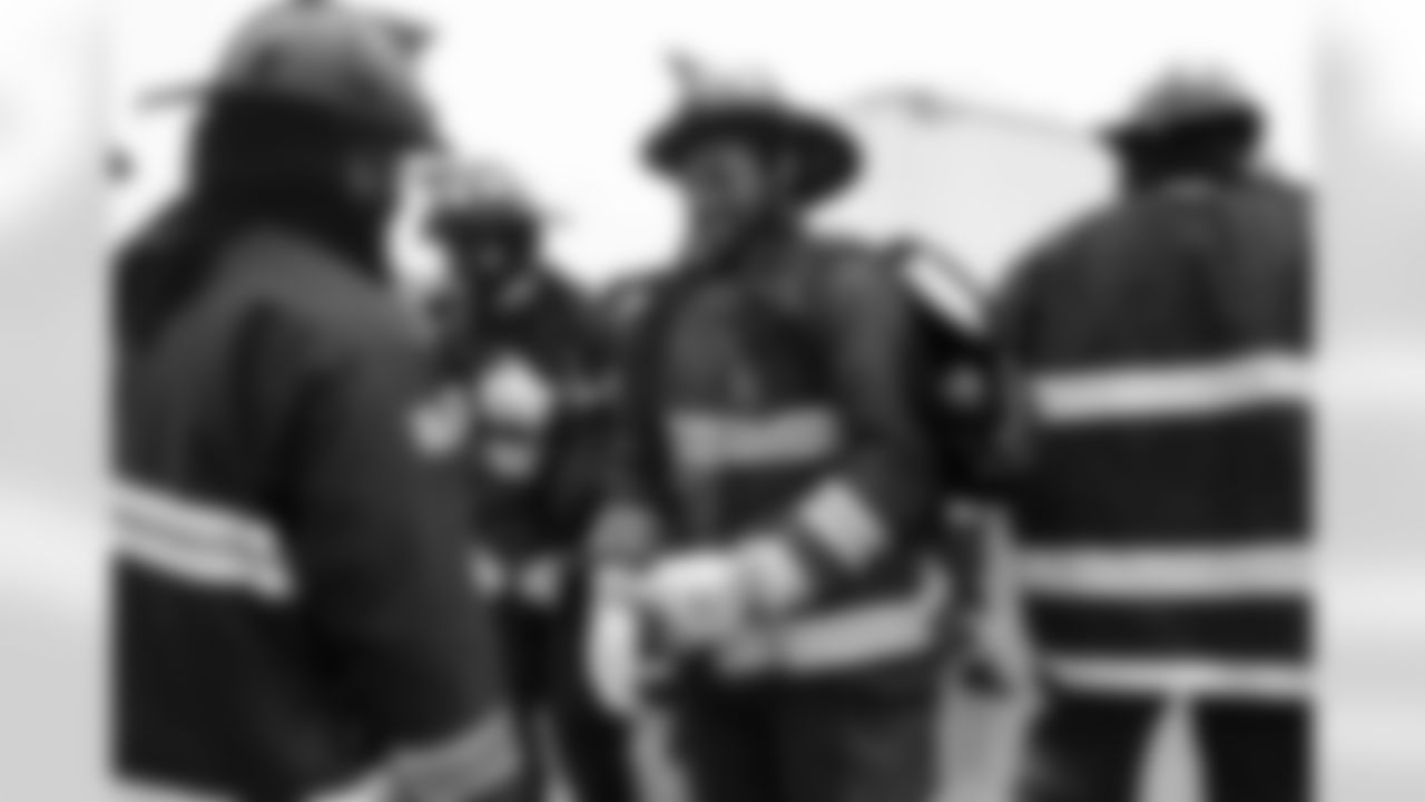 Malik Reed visits the Denver Fire Academy on November 2, 2021 in recognition of First Responders Appreciation Day.