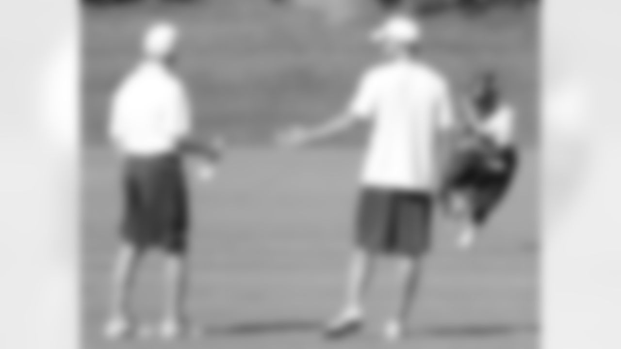 John Fox and Adam Gase watch Montee Ball
