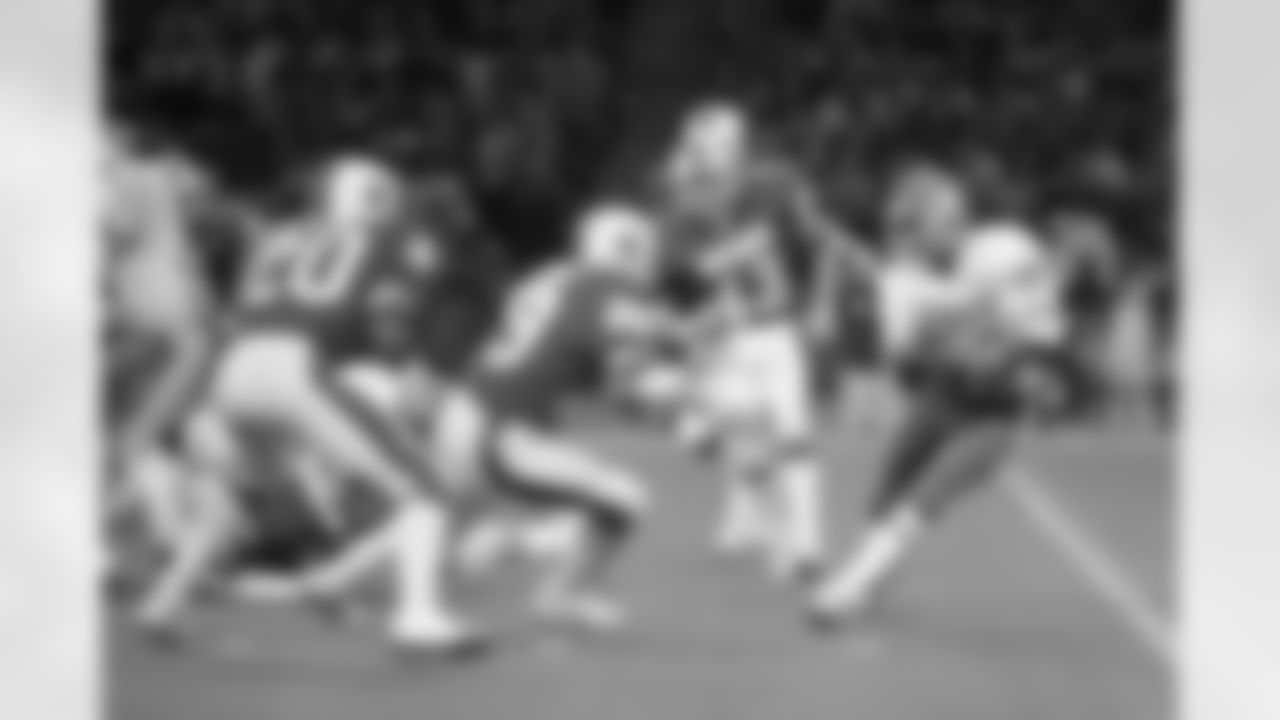 Rick Upchurch (80) of the AFC's Denver Broncos, heads up field and toward the NFC's Cliff Harris (43) of the Cowboys, and Eddie Brown (29) of the Redskins, in the Pro Bowl in Seattle, Jan. 17, 1977. (AP Photo)