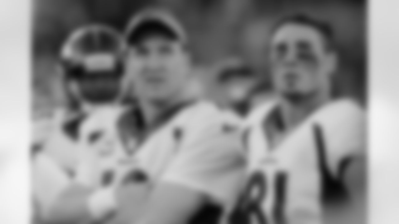 Peyton Manning and Joel Dreessen