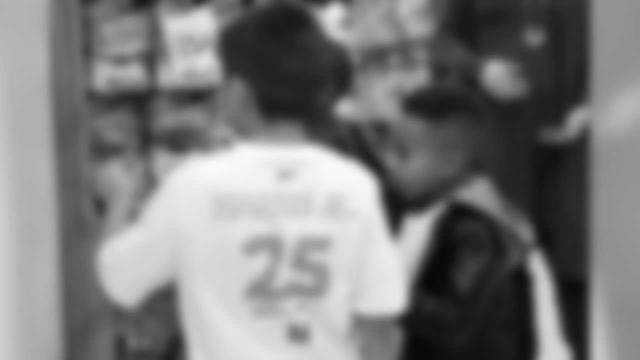 Chris Harris Jr. hosts his 2018 "Shop with a Jock" event, in which he gives 50 children a shopping spree and dinner.
