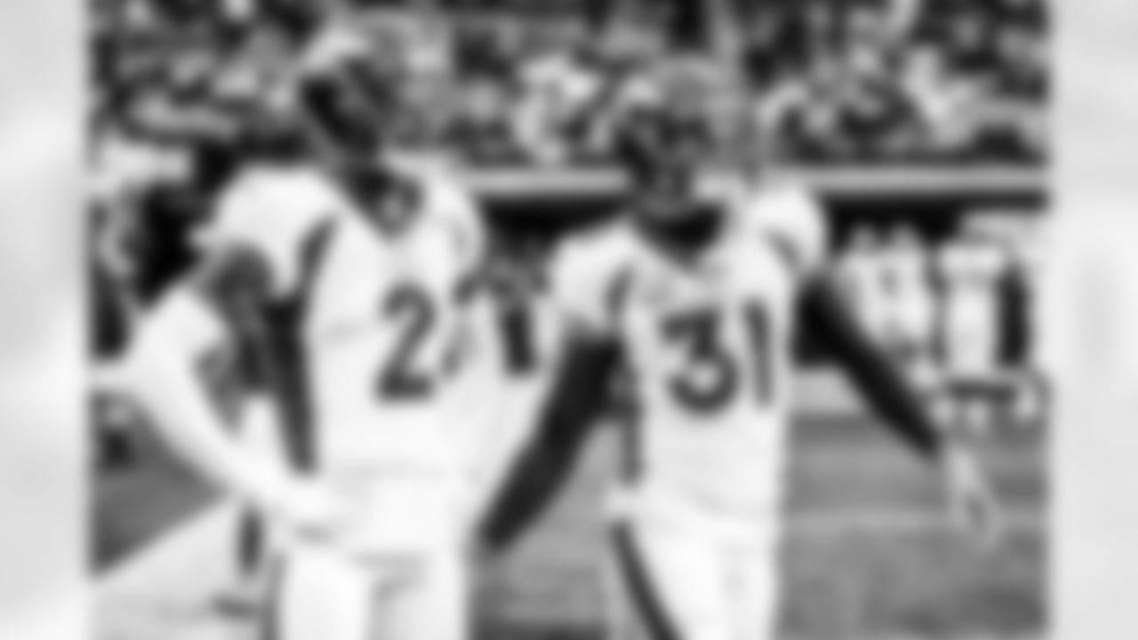 Pat Surtain II and Justin Simmons before the Broncos' Week 16 game against the Las Vegas Raiders at Allegiant Stadium in Las Vegas, Nevada on December 26, 2021. (Photo by David Dermer)
