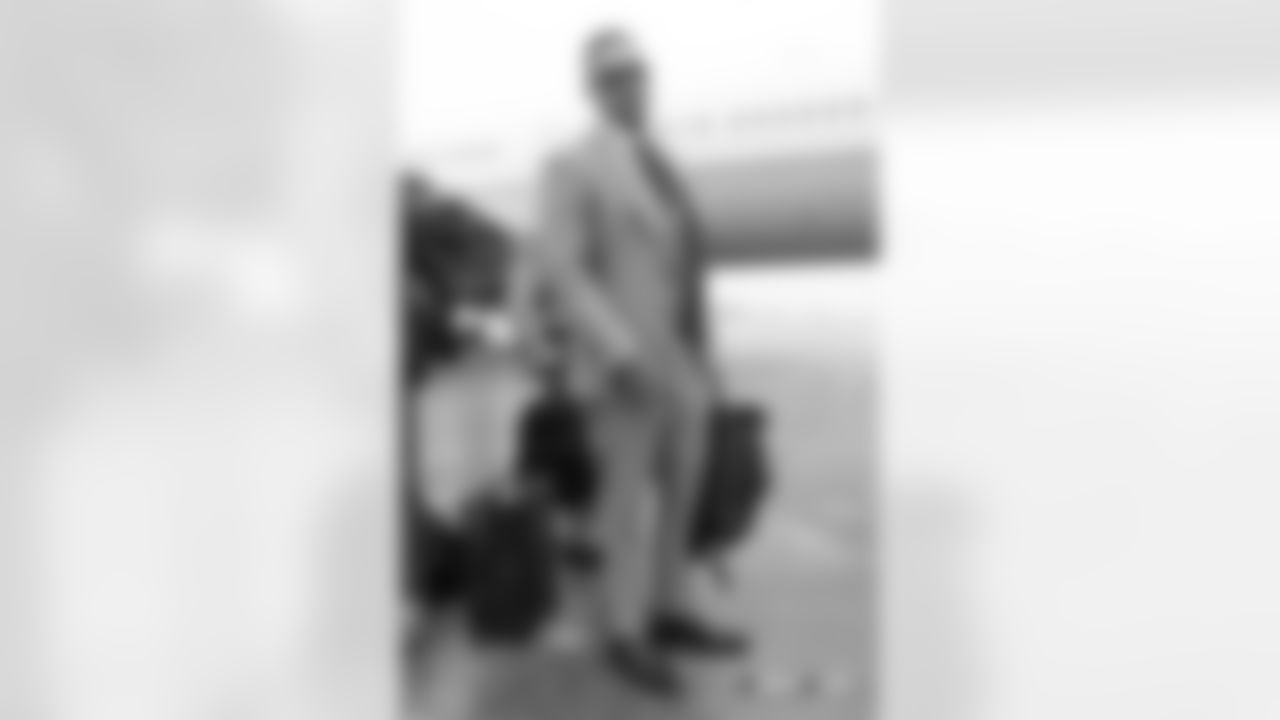 Shane RayÊwalks on the tarmac to the plane before the flight during the team's travel for their Week 11 game against the Los Angeles Chargers on November 17, 2018.