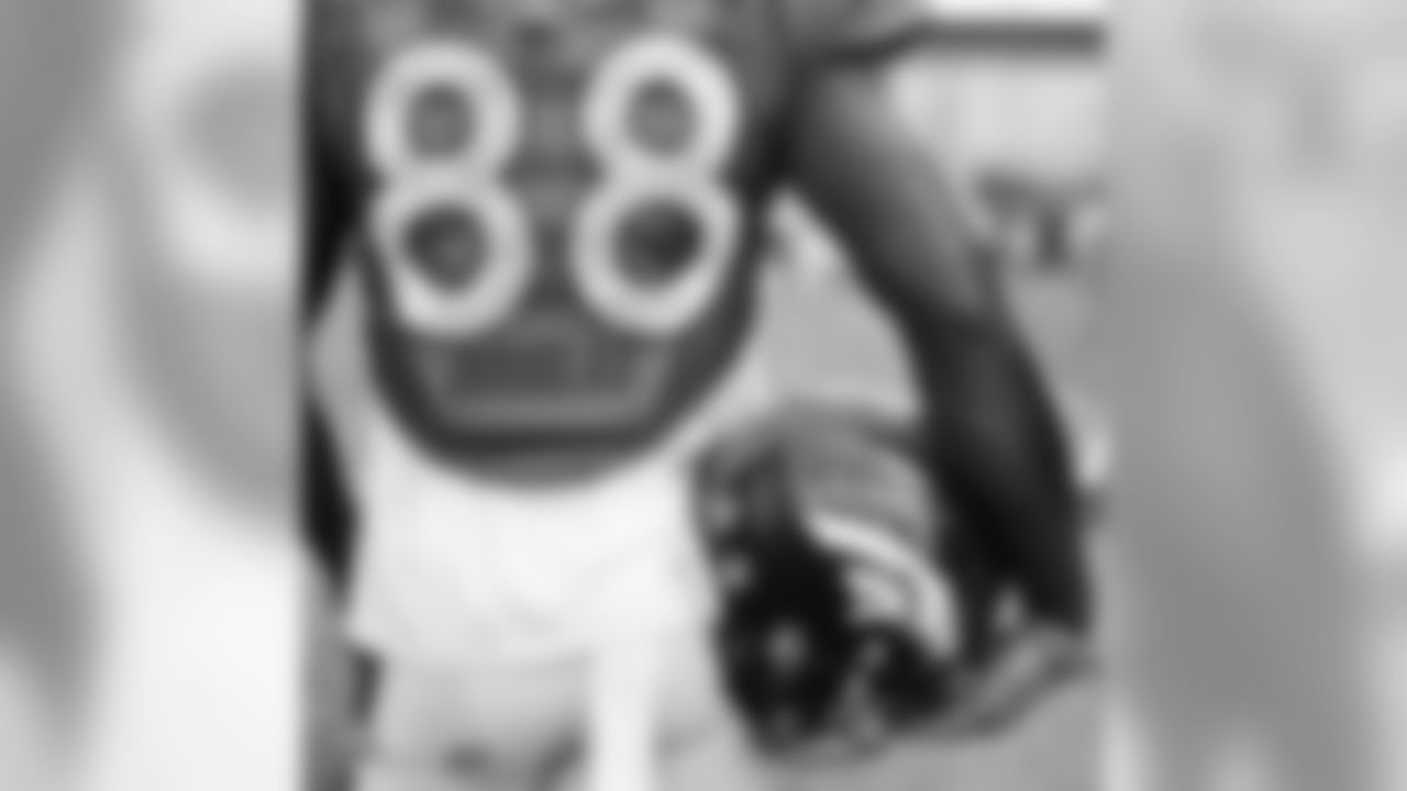 Wide receiver Demaryius Thomas (88) holds his helmet during training camp in 2018 at UCHealth Training Center. These photos were made with a Hasselblad medium-format camera. Photo by Gabriel Christus.