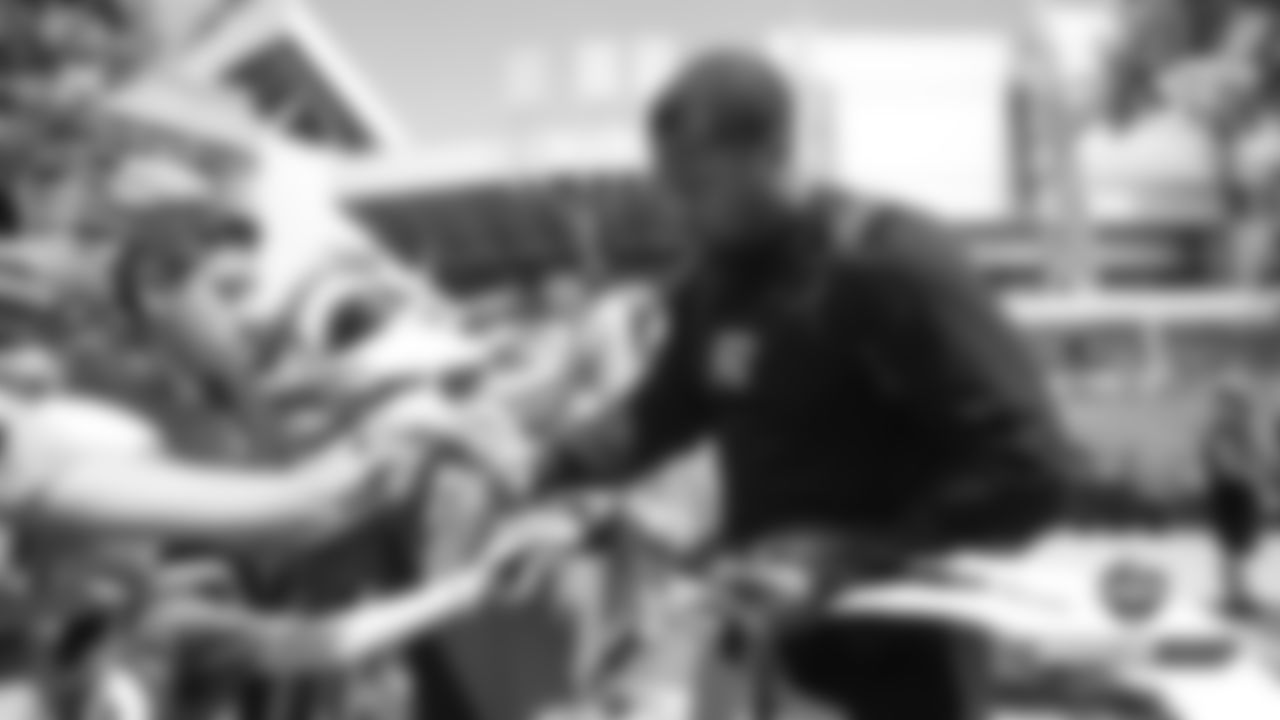 Bradley Chubb signs autographs before practice on Day 9 of training camp at Broncos Stadium at Mile High on July 27, 2019.