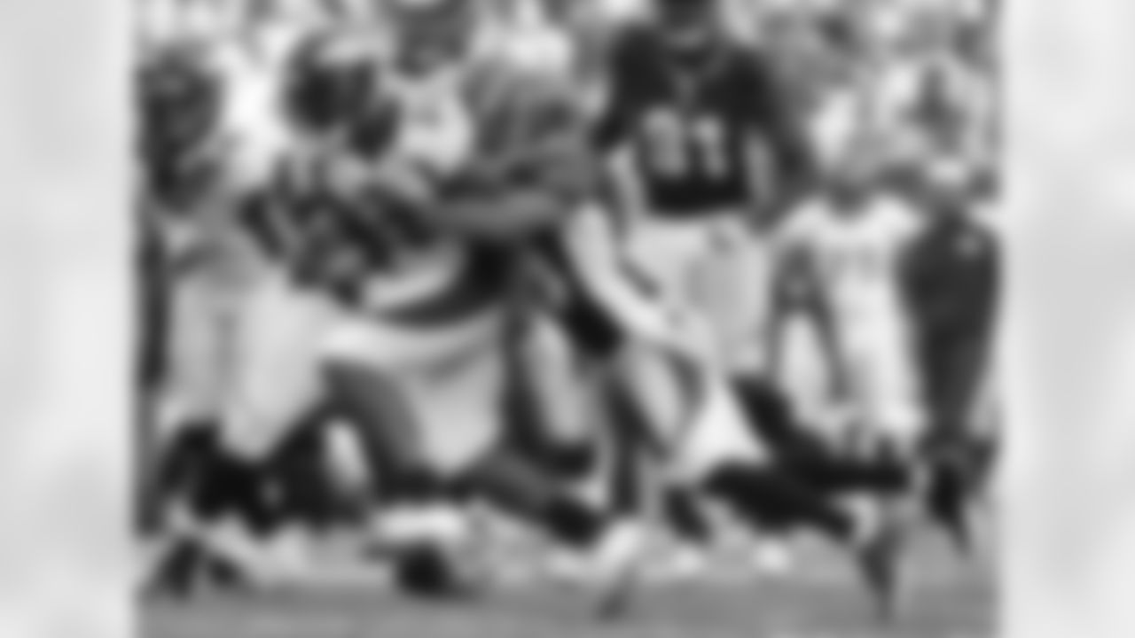 McGahee takes one of his 23 carries on the day.