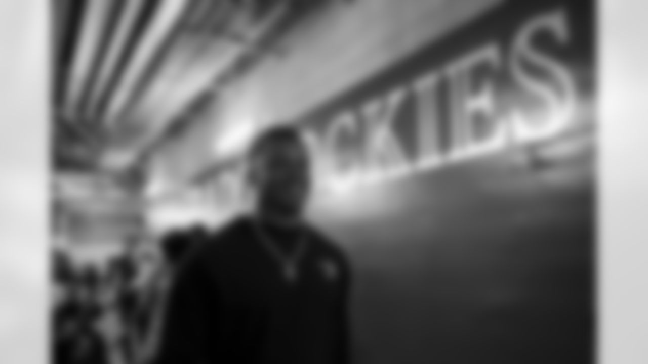 Russell Wilson walks through the tunnel during his visit to the Colorado Rockies' Opening Day game at Coors Field in Denver, Colorado on April 8, 2022. (Photo by Ben Swanson)
