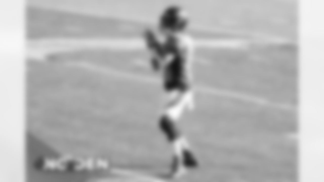 Kendall Hinton warms up before the Broncos' Week 12 game against the New Orleans Saints at Empower Field at Mile High on November 29, 2020. (Photo by Gabriel Christus)