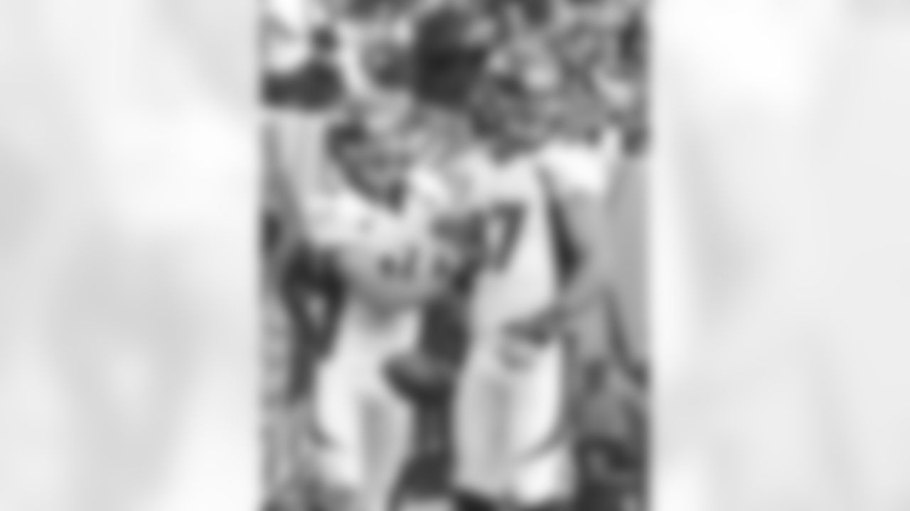 The two receivers celebrate the touchdown.
