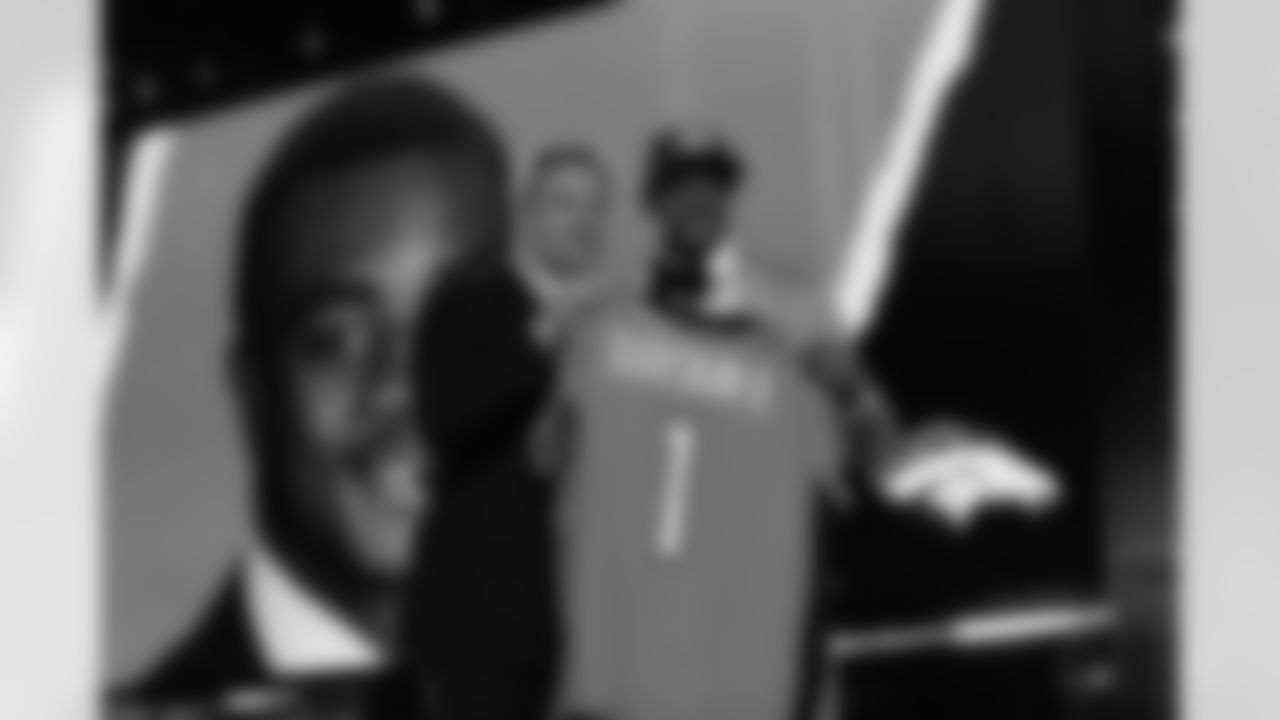 Alabama cornerback Patrick Surtain II poses with NFL commissioner Roger Goodell after being drafted by the Denver Broncos during the 2021 NFL Draft on Thursday, April 29, 2021 in Cleveland, Ohio. (Aaron Doster/NFL)